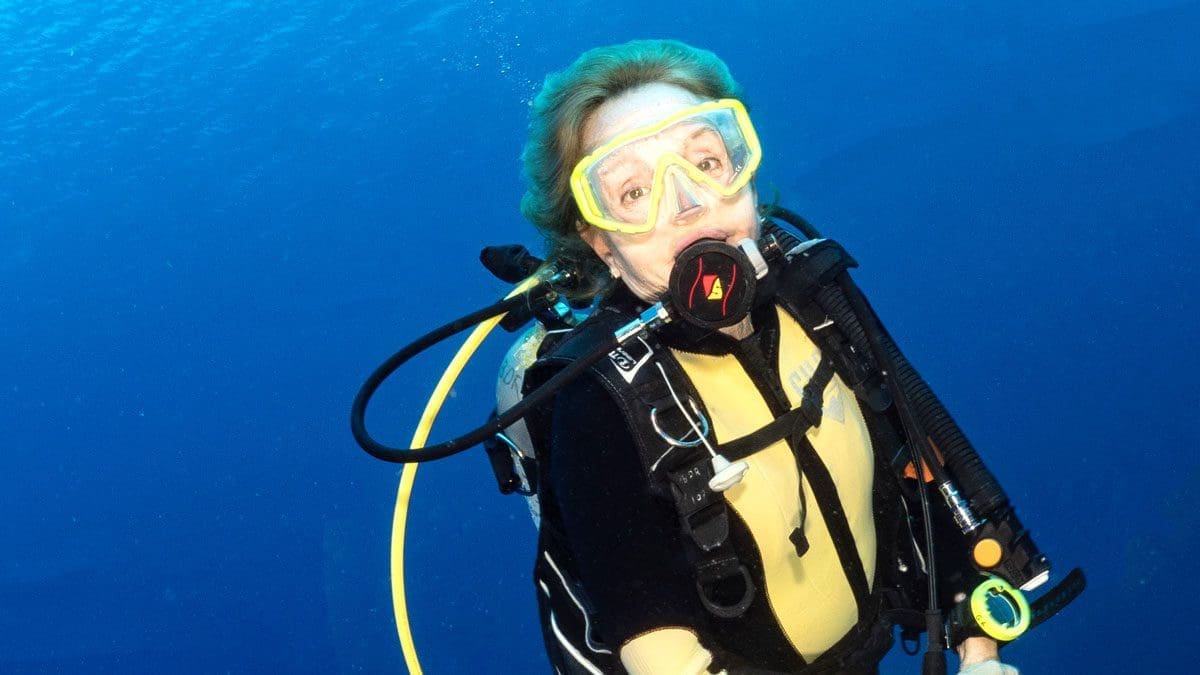 Grandmother, kids and diving family diving